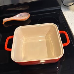 Le Creuset Red and Cream Cookware Dish